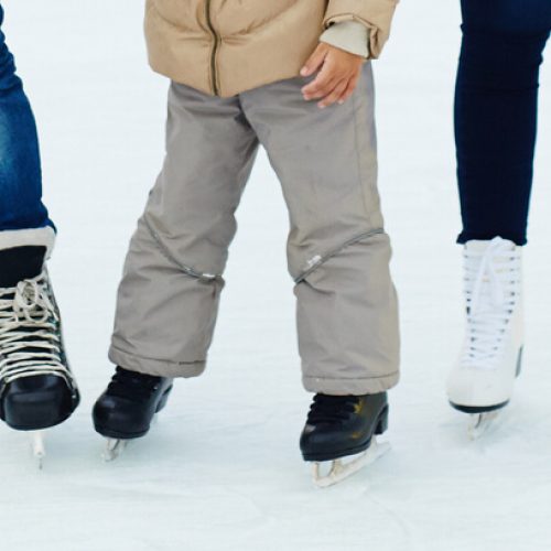 family-on-ice-rink